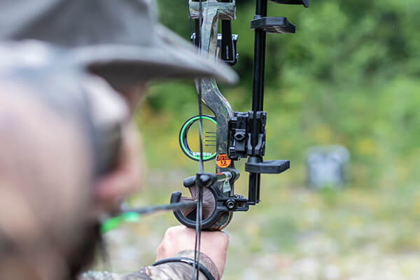 Photo of an archer using a compound bow